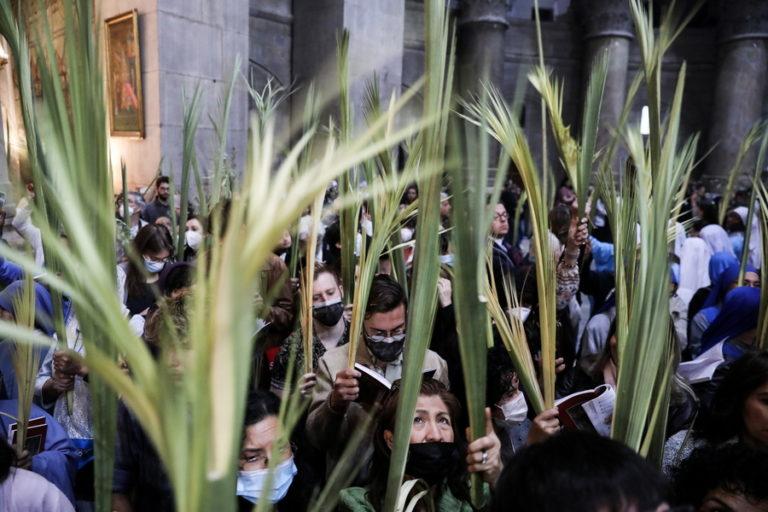 Palm Sunday procession at Church of the Holy Sepulchre in Jerusalem
